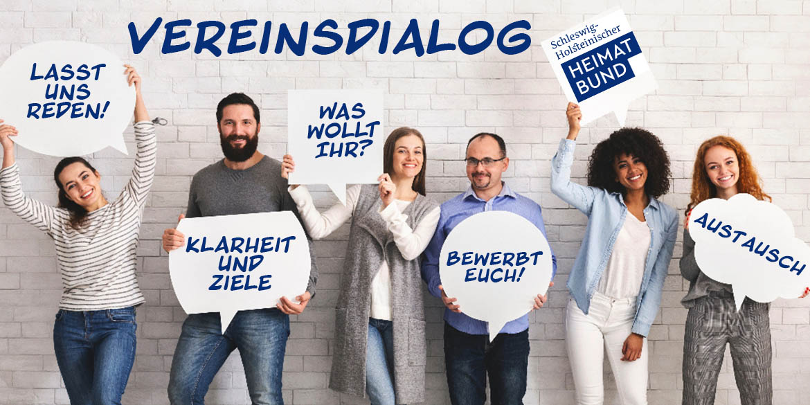 Eine Gruppe von Menschen mit Schildern